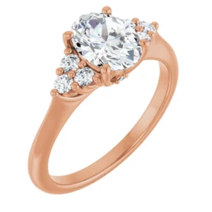 Engagement Ring with Three-Diamond Clusters